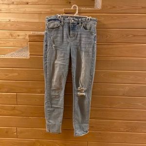 Light washed ripped jeans. Size 29.